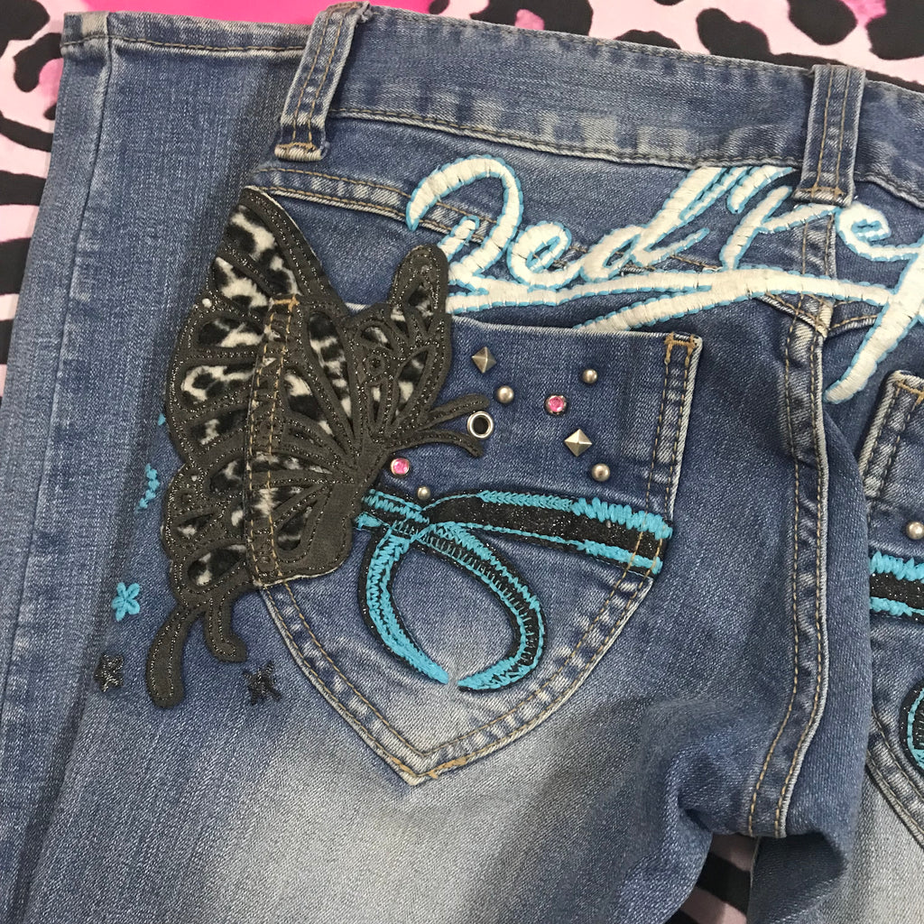 Red Pepper RARE leopard butterfly jeans