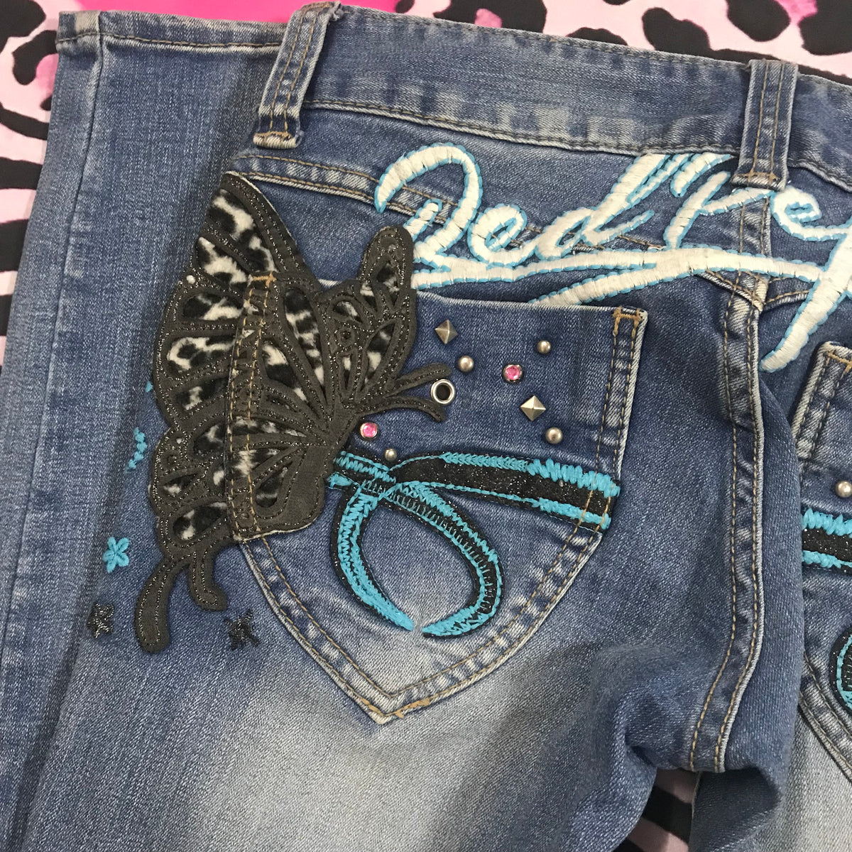 Red Pepper RARE leopard butterfly jeans